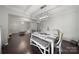 Open dining room with hardwood floors and elegant lighting, adjacent to the home's living spaces at 1718 Still River Way, Fort Mill, SC 29708