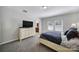 Calm main bedroom with carpet, white dresser, neutral colors, and an en-suite bathroom at 1718 Still River Way, Fort Mill, SC 29708