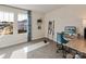 Bright office with large windows, streamlined desk, yoga mat, and a modern aesthetic at 1726 Braemar Village Dr, Monroe, NC 28110