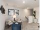 Comfortable upstairs sitting area featuring coordinated decor and ample natural light from nearby stairway at 1726 Braemar Village Dr, Monroe, NC 28110