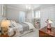 Cozy bedroom with carpet, large windows, ceiling fan, and comfortable decor at 1849 Oakmont Dr, Denver, NC 28037
