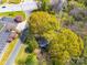 Aerial shot showcasing the home nestled amidst lush greenery, near convenient parking and roadways at 1903 Marshall Ave, Gastonia, NC 28052