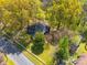 Overhead view of the home and its expansive lot, surrounded by mature trees at 1903 Marshall Ave, Gastonia, NC 28052