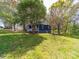 Beautiful backyard featuring a well-maintained lawn and mature trees at 1903 Marshall Ave, Gastonia, NC 28052