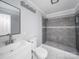 Modern bathroom with tiled shower, sleek vanity, and contemporary fixtures at 1903 Marshall Ave, Gastonia, NC 28052