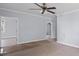 Spacious bedroom with light wood floors, ceiling fan, and natural light at 1903 Marshall Ave, Gastonia, NC 28052