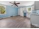Spacious kitchen with light wood floors, white cabinets, and natural light at 1903 Marshall Ave, Gastonia, NC 28052