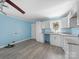 Well-lit kitchen featuring bright white cabinets and stone countertops at 1903 Marshall Ave, Gastonia, NC 28052