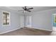 Spacious living room with light gray walls, white trim, and wood-look flooring at 1903 Marshall Ave, Gastonia, NC 28052