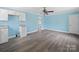 Spacious living room with modern ceiling fan and plenty of natural light at 1903 Marshall Ave, Gastonia, NC 28052