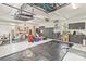 Spacious garage with ample storage space and organization systems for vehicles and equipment at 19040 Mary Ardrey Cir, Cornelius, NC 28031