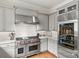 Gourmet kitchen with stainless steel appliances, custom cabinets, and granite countertops at 19040 Mary Ardrey Cir, Cornelius, NC 28031