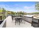 Inviting deck with outdoor dining set overlooking the lake at 19040 Mary Ardrey Cir, Cornelius, NC 28031
