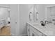 Bathroom with white vanity and black hardware, showcasing modern design and ample counter space at 2017 Autumn Dr, Monroe, NC 28110