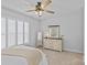 Bright bedroom featuring natural light and a dresser with a mirror at 2017 Autumn Dr, Monroe, NC 28110