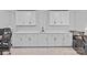 Bonus room cabinets with sink, countertop, and plenty of storage space at 2017 Autumn Dr, Monroe, NC 28110