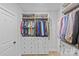 Well-organized closet with built-in shelves, drawers, and hanging space at 2017 Autumn Dr, Monroe, NC 28110