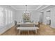 Elegant dining room with natural light and a modern farmhouse style table setting at 2017 Autumn Dr, Monroe, NC 28110