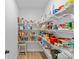 Well-stocked pantry featuring metal shelving, offering ample storage space for groceries and household items at 2017 Autumn Dr, Monroe, NC 28110