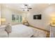 Bright bedroom with hardwood floors, natural light, and neutral decor, creating a calm and inviting atmosphere at 20635 Queensdale Dr, Cornelius, NC 28031