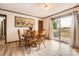 Charming dining room with access to the deck through sliding glass doors at 209 Vanderbilt Ave, China Grove, NC 28023