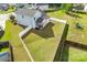 Expansive backyard featuring a well-maintained lawn, white fence, and covered patio, perfect for outdoor enjoyment at 2222 Smoltz Dr, Rock Hill, SC 29730