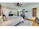 This bedroom has a ceiling fan, walk-in closet, and ensuite bathroom with a stand-up shower at 2222 Smoltz Dr, Rock Hill, SC 29730