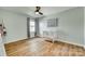 Bright bedroom featuring wood floors, a ceiling fan, and ample space for a crib at 2222 Smoltz Dr, Rock Hill, SC 29730