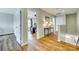 Hallway with wood flooring and open access to an office space with desk at 2222 Smoltz Dr, Rock Hill, SC 29730