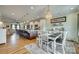 Open-concept layout featuring a kitchen with island and dining area flowing seamlessly into the living room at 2222 Smoltz Dr, Rock Hill, SC 29730