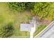 Birds-eye view of a home with surrounding lush landscaping and a driveway at 2300 Linwood Rd, Gastonia, NC 28052