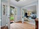 Open foyer with hardwood floors and a view into the living room, highlighting the home's spacious layout at 2812 Edgebrook Cir, Matthews, NC 28105