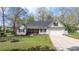 Charming single-Gathering home with a well-manicured lawn, a cozy front porch, and an attached garage at 2987 Irish St, Newton, NC 28658