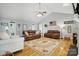 Spacious living room with hardwood floors, a vaulted ceiling, and comfortable seating, ideal for entertaining at 2987 Irish St, Newton, NC 28658
