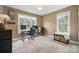 Home office area with a work area, natural light from the windows, and a ceiling fan at 2987 Irish St, Newton, NC 28658
