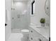 Modern bathroom featuring a glass shower and stylish vanity with gold fixtures at 3038 Northampton Dr, Charlotte, NC 28210