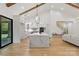 Spacious kitchen with large island, stainless appliances, and modern lighting at 3038 Northampton Dr, Charlotte, NC 28210
