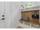 Functional mudroom with built-in storage and a bench at 3038 Northampton Dr, Charlotte, NC 28210