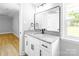 Tastefully designed bathroom features a vanity and granite countertop at 307 S Ransom St, Gastonia, NC 28052
