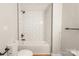 Modern bathroom featuring white subway tile and dark modern fixtures at 307 S Ransom St, Gastonia, NC 28052