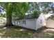 Home featuring vinyl siding and shuttered windows at 307 S Ransom St, Gastonia, NC 28052