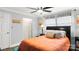 A cozy bedroom with natural light, a bed with decorative pillows and bedside tables at 318 Lake Montonia Rd, Kings Mountain, NC 28086