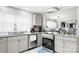 Beautiful kitchen featuring granite countertops, updated appliances and ample storage space at 318 Lake Montonia Rd, Kings Mountain, NC 28086