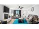 A comfortable living room with plush seating, fireplace and large wall-mounted television at 318 Lake Montonia Rd, Kings Mountain, NC 28086