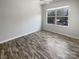 Bright bedroom with neutral paint and hardwood floors at 3489 Chagall Ct, Charlotte, NC 28205