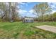 Large backyard with a shed, offering plenty of outdoor storage at 413 E Henderson Es St, East Spencer, NC 28144