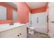 This bathroom has a toilet, sink and shower/tub at 413 E Henderson Es St, East Spencer, NC 28144