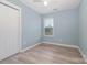 Cozy bedroom with a bright window and closet at 413 E Henderson Es St, East Spencer, NC 28144