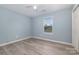Small bedroom features a window and a closet at 413 E Henderson Es St, East Spencer, NC 28144