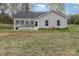Charming home features a sunroom and spacious yard, ideal for outdoor enjoyment and expansion at 413 E Henderson Es St, East Spencer, NC 28144
